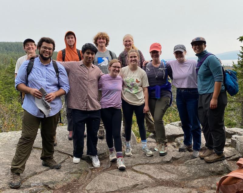 Students and faculty stop for a picture during their hike on the Schoodic Head Trail